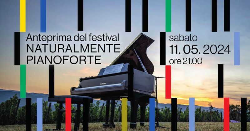 Anteprima del festival: un pianoforte a coda al tramonto con i tasti colorati
